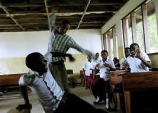 A student being canned by a teacher.