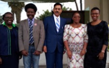 The Cabinet Secretary (CS) for Public Service, Gender and Youth Affairs Sicily Kariuki (second right) with BIDCO Africa CEO Vimal Shah (in blue suit) posing for a photo after the signing of a partnership to empower women and youth at the BIDCO headquarters in Thika recently.