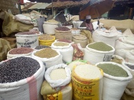 Sarah Wairimu selling cereals at her shop in Jamhuri Market in Thia.
