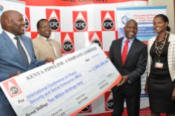 Kenya Pipeline Company Managing Director, Joe Sang presenting a dummy cheque of Kshs. 2 million towards the facilitation of the first ever International Peace Conference that will formally be opened by CS Internal Security Joseph Nkaisery today (Wednesday).
